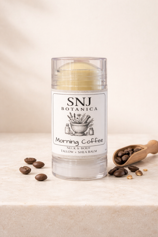 SNJ Botanica 'Morning Coffee' neck and body balm with coffee beans on a beige background
