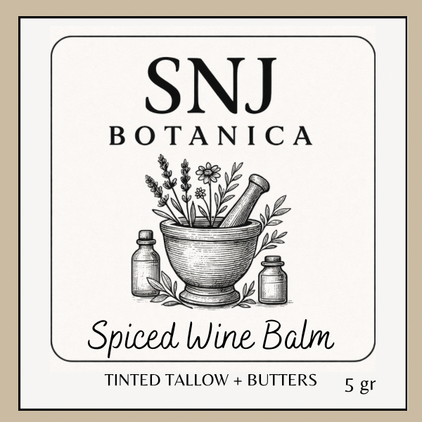 SNJ Botanica Spiced Wine Balm label with mortar and pestle illustration on a beige background